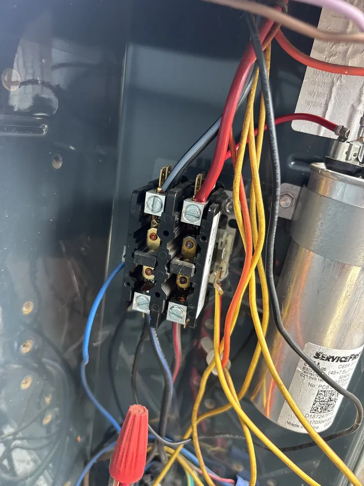 Contactor and dual-run capacitor wiring inside a condenser control panel in Folsom