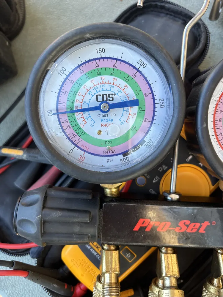 Manifold gauge and clamp meter on an Orangevale service call