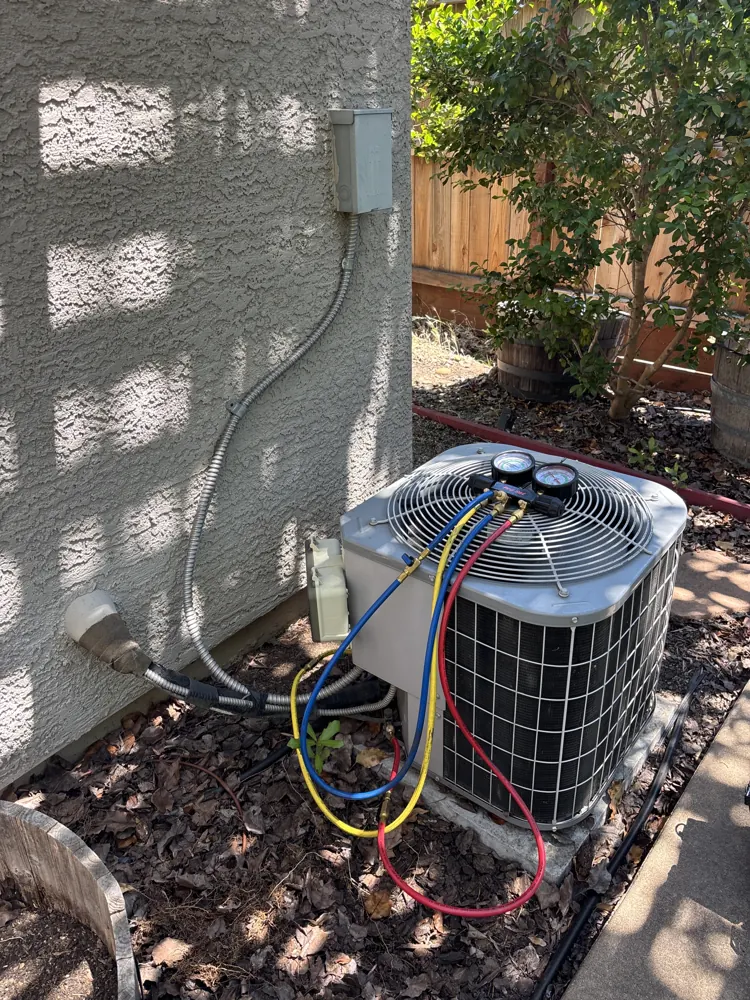 Gauges connected to a Carrier condenser at a Rancho Cordova home
